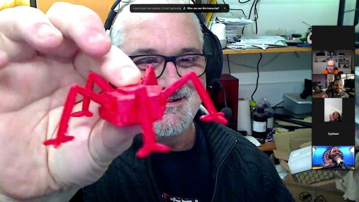 Club TWiT member John Arnold holding a 3D-printed figurine