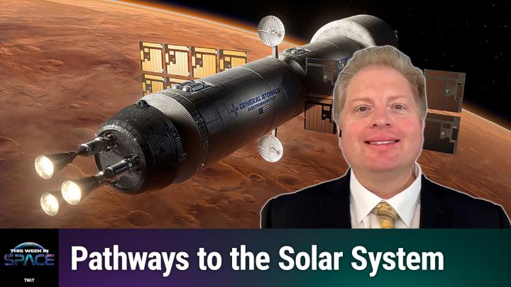 A satellite is floating in space, with Dr. O'Brien in the bottom right corner of the image.
